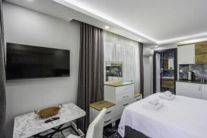 Postel nebo postele na pokoji v ubytování Terra Garden Hotel