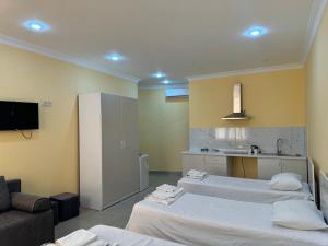 Voodi või voodid majutusasutuse Red Hotel Yerevan Center toas