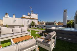 Posezení v ubytování Allo Apartments Plateros Centro Jacuzzi Comunitario