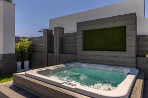 Bazén v ubytování Allo Apartments Plateros Centro Jacuzzi Comunitario nebo v jeho okolí