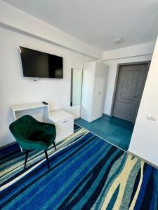 TV a/nebo společenská místnost v ubytování Navis Mamaia Nord