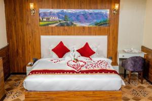 Voodi või voodid majutusasutuse Hotel Palazzo toas