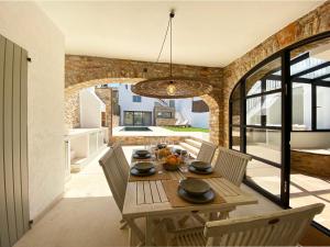 a dining room with a wooden table and chairs at Casa BlauBegur - ref 056 in Begur
