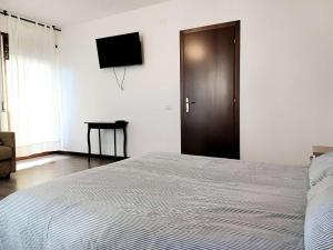 Postel nebo postele na pokoji v ubytování Nottetempo Verona
