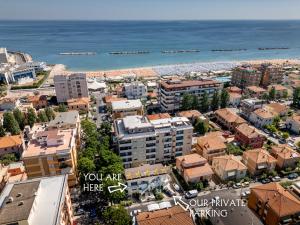 an aerial view of a city with the beach at VIP Bright experience Fano beach free parking in Fano