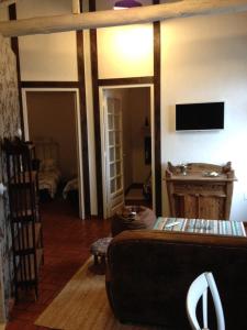 A television and/or entertainment centre at La Casita Del Castañar