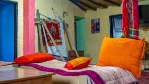 Postel nebo postele na pokoji v ubytování Gîte Forest Tagroumte + 37 fotografií