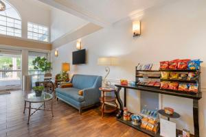 a living room with a couch and a table at Best Western Corvallis in Corvallis