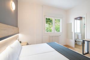 Postel nebo postele na pokoji v ubytování Hotel Alda Vía Norte