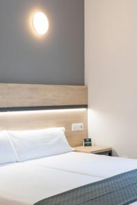Postel nebo postele na pokoji v ubytování Hotel Alda Vía Norte