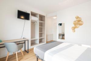 Postel nebo postele na pokoji v ubytování Hotel Alda Vía Norte