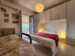 Ένα ή περισσότερα κρεβάτια σε δωμάτιο στο Le Terrazze - Fuori dal Caos