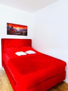 Postel nebo postele na pokoji v ubytování Apartman Anturijum