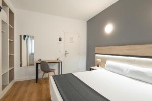 Postel nebo postele na pokoji v ubytování Hotel Alda Vía Norte