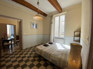 Postel nebo postele na pokoji v ubytování Résidence Verdi - Appartements meublés en centre ville