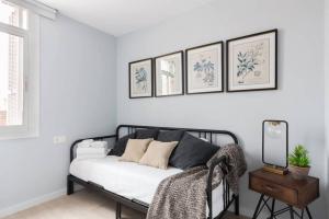 Posteľ alebo postele v izbe v ubytovaní 2 Bdr Penthouse In Grcia + 4 fotografie