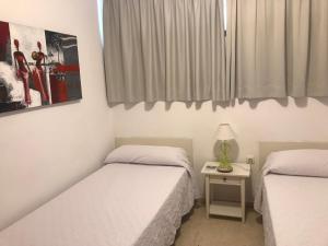 Postel nebo postele na pokoji v ubytování Apartamentos Quintero – Adults Only