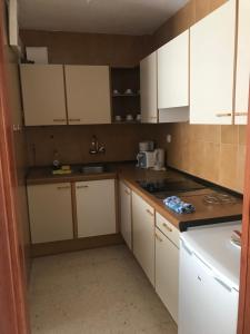 Kuchyň nebo kuchyňský kout v ubytování Apartamentos Quintero – Adults Only