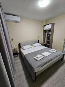Postel nebo postele na pokoji v ubytování Mansarda Iris