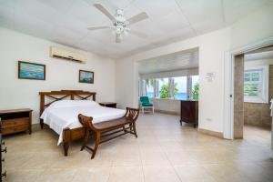 a bedroom with a bed and a ceiling fan at Clearwater home in Saint Peter