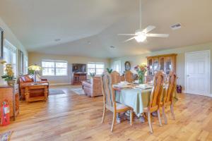 a dining room and living room with a table and chairs at On Lake Istokpoga Lorida Home with Lanai! in Sebring