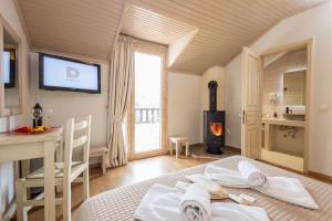 A bed or beds in a room at Dimatis