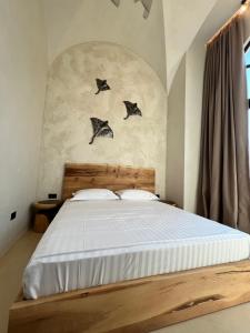 Postel nebo postele na pokoji v ubytování Casa Boha