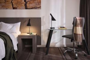 Postel nebo postele na pokoji v ubytování Rydges World Square
