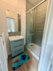 Et badeværelse på Maison décoration Disney à 10 min du Parc