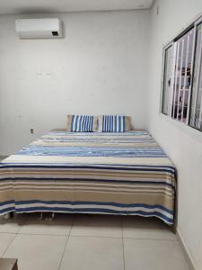 En eller flere senge i et værelse på Recanto João E Maria + 6 billeder