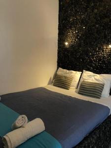 Letto o letti in una camera di Ichor Suites