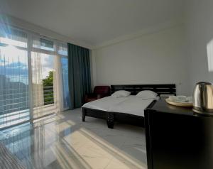 Voodi või voodid majutusasutuse Kolkhi Guest House toas