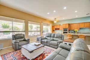 a living room with a couch and chairs and a table at Spacious Home in SaddleBrooke 55-Plus Community! in Catalina