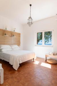 Giường trong phòng chung tại La Villa