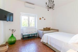 Giường trong phòng chung tại La Villa