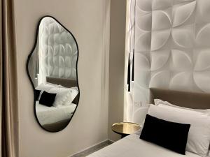 Postel nebo postele na pokoji v ubytování Elegant Rooms