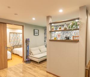מיטה או מיטות בחדר ב-Guest House Kubo Homes Tengachaya 1