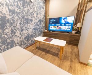 טלויזיה ו/או מרכז בידור ב-Guest House Kubo Homes Tengachaya 1