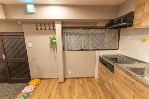 מטבח או מטבחון ב-Guest House Kubo Homes Tengachaya 1