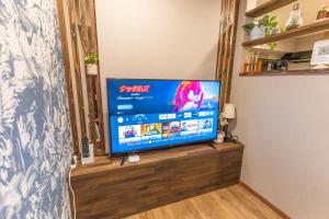 טלויזיה ו/או מרכז בידור ב-Guest House Kubo Homes Tengachaya 1