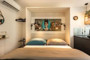 Postel nebo postele na pokoji v ubytování Studio Deluxe RoMa II