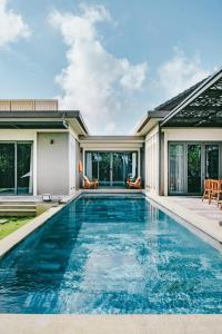 an image of a swimming pool in a house at Villa Luxury 3 Phòng ngủ Private Pool - Coastar Hồ Tràm in Long Hai