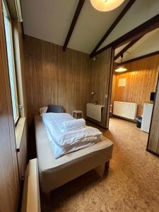 Arhus Cottage and Camping客房内的一张或多张床位