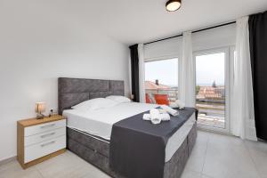 Katil atau katil-katil dalam bilik di Apartman Dokić 1