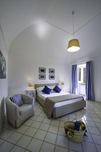 Postel nebo postele na pokoji v ubytování Casa Assunta B&B