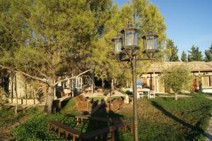 a street light in the yard of a house at Casa rural la grulla in Montmesa