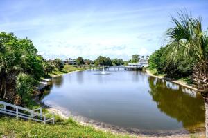 a river with a bridge in the middle at Copper Cay Family Friendly Central Location in Destin +43 photos