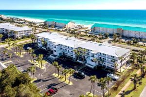 an aerial view of a resort next to the beach at Sunrise Destin-ation Beach view Heated Pool in Destin