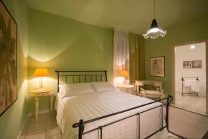 Postel nebo postele na pokoji v ubytování B&B Maison Biagetti