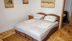 Кровать или кровати в номере Sibenik City Center Apartment